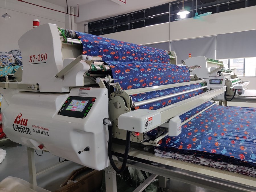 Fabric spreading table at the Guangzhou workshop