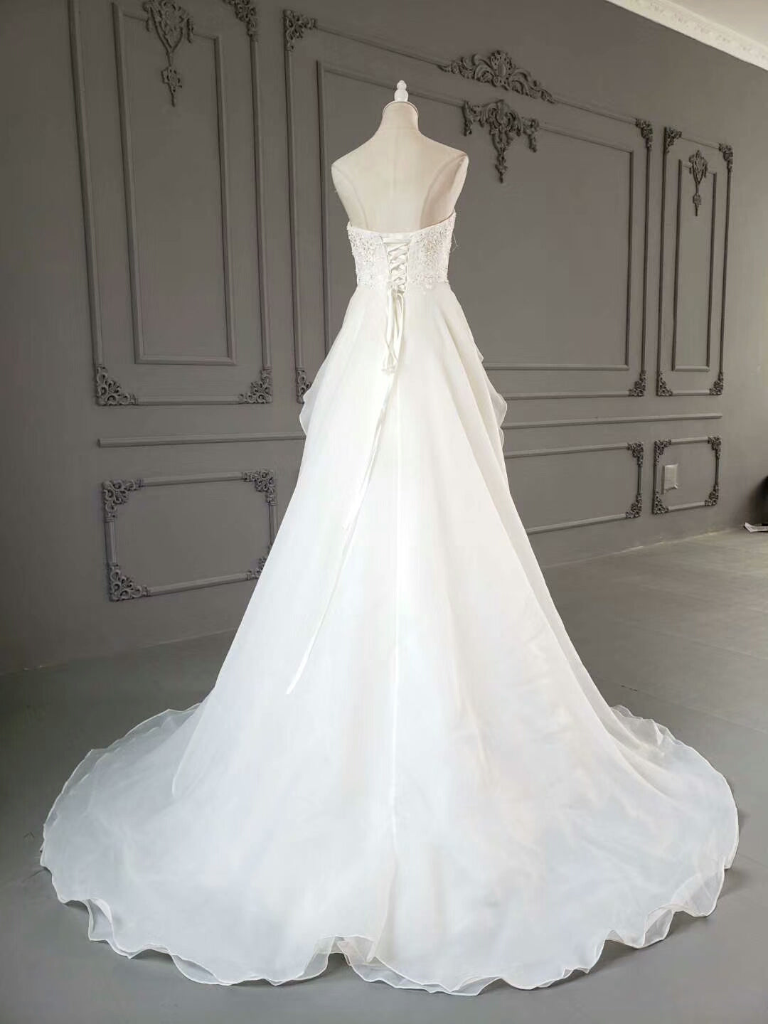 Luxurious A-line slit strapless wedding dress